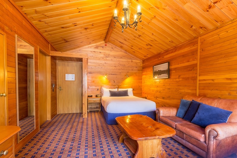 Cozy lodge room with a fireplace